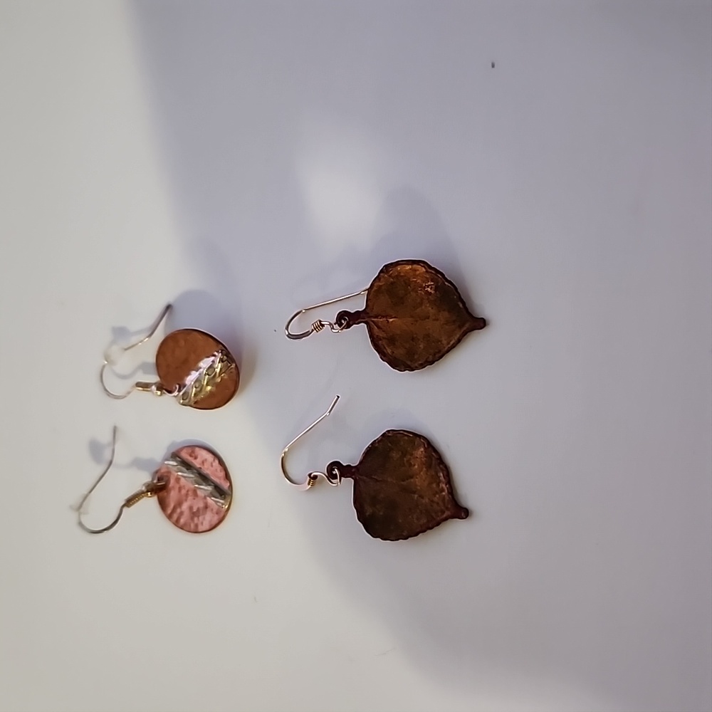 Rose gold earrings of two pairs